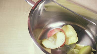 Slow motion knife to push the apple off the board