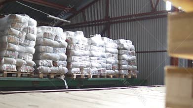 Different bags and boxes inside a storage food warehouse
