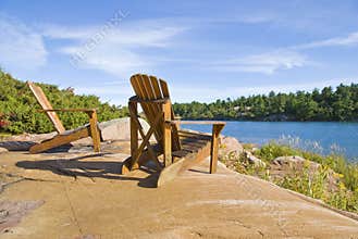 Muskoka Chairs On a Big Rock