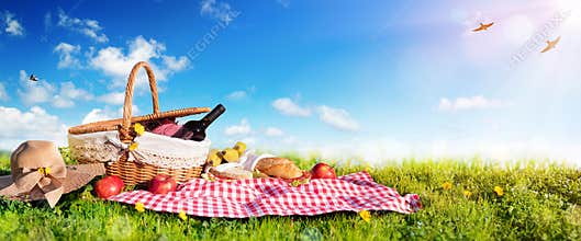 Picnic - Basket With Bread And Wine On Meadow