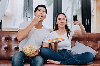 Couple together watching television