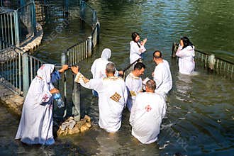 Unidentified Christian pilgrims during mass baptism ceremony at