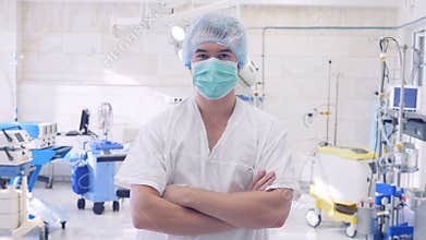 Portrait of a surgeon who looks into camera at a modern clinic or hospital. Concept: doctor, patient care, health.