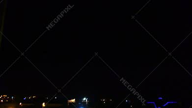 Lightning strikes the sky at night in the city