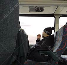 Phone Call While Riding The Bus, Commuter Talking on a Cell Phone, New Jersey, USA