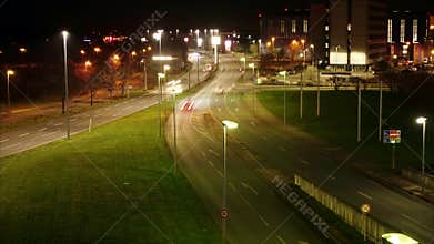 Traffic on street of Hannover in Germany at winter night. Timelapse.