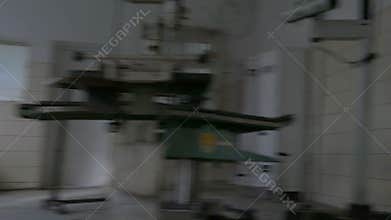 POV of insane person spinning in asylum theater