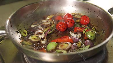 Cook cooking dish in restaurant