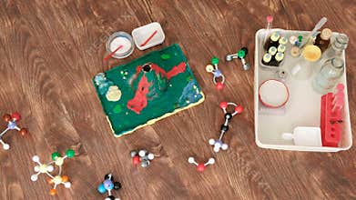 Preparations for carrying out chemical experiment with a clay volcano.