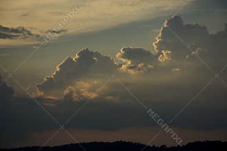Cumulonimbus clouds brightly lit