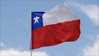 The flag of Chile waves in the wind in slow motion