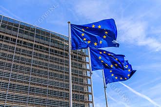 Brussels, Belgium. Flags of the European Union in front of the Berlaymont building in Brussels.