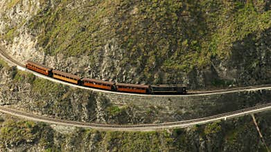 Touristic Train At Nariz Del Diablo On Zig Zag Railway Pattern Due High Altitude Difference