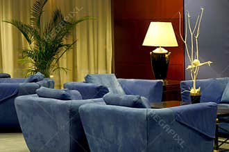 Hotel lobby with comfortable blue couches