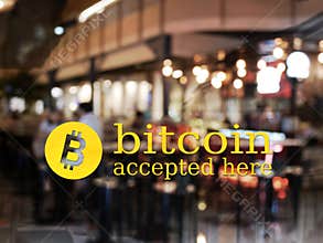 Word bitcoin accepted here with blur restaurant background.