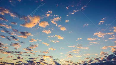 Time lapse video of colorful clouds passing at sunset