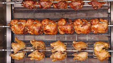 Rotisserie Chicken grill. Street food at the stand.