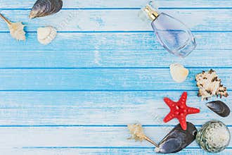 Sea Shells Decorations Parfume Bottle And Sea Star On Blue And W