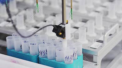 At the medical center in the lab, the robot automatically performs the analysis to determine cancerous cells in the