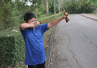 Bully boy aiming the target