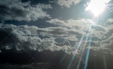 A sun beetween clouds