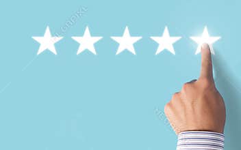 Hand choosing 5 stars rating on blue background - Positive feedback