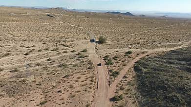 Flight over long highway at monument valley in Utah - Drone Aerial over cars in Arizona. Top view drone footage flying