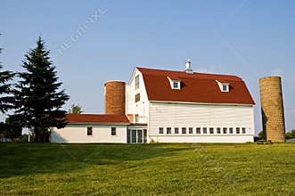 Barn With Red Gambrel Roof and Silos