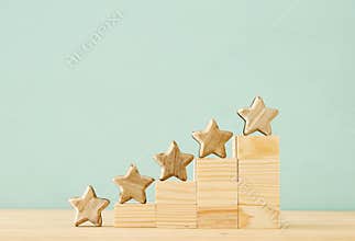 Concept image of setting a five star goal. increase rating or ranking, evaluation and classification idea.