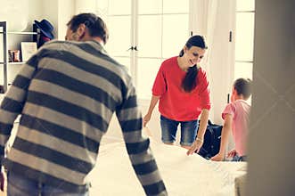 Kid helping parents for house chores