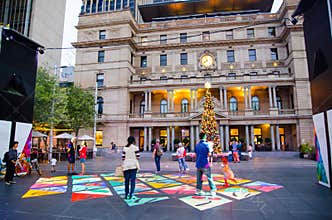 Christmas projections animated on the ground at Customs House Square produced by the City of Sydney.