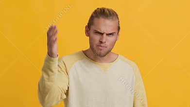 Angry Young Man Expressing Aggression, Talking And Gesturing At Camera, Blaming Somebody