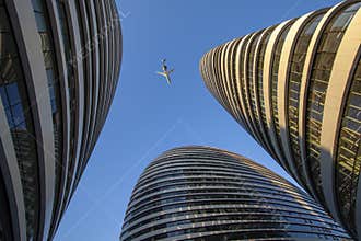 Wangjing Soho and airplane, China