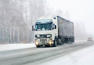 Truck goes on winter road