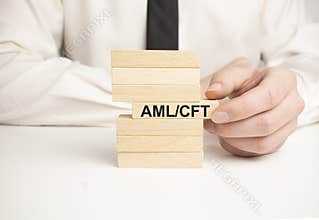 wooden block with aml cft on the table