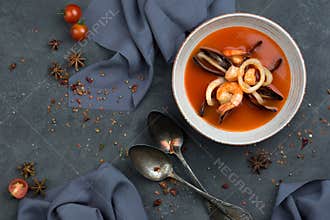 Seafood soup, shrimp and mussels in a plate. food photography