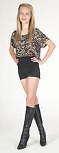 Teen Girl Modeling Fashion Clothes in Studio