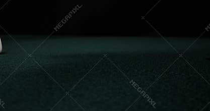 Rolling dice in slow motion. Dices falling to green table. Gambling and casino concept