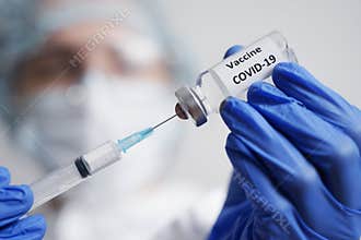 Doctor Prepares the Syringe for Vaccination COVID-19