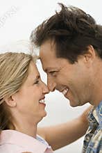 Couple looking into each other's eyes.