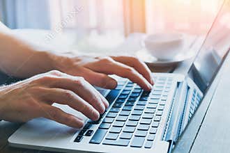 Typing on keyboard, close up of hands of business person working on computer