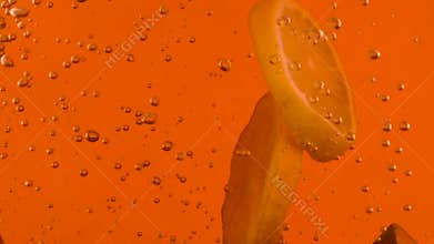 Closeup liquid of tea with ice. Abstract water background