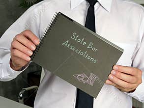 Business concept about State Bar Associations with sign on the piece of paper