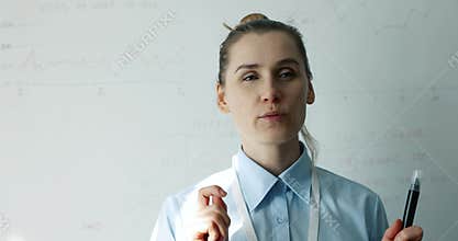 Business seminar speaker talking with audience during the presentation