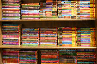 Kolkata, India, February 12.2021. A photo of bookshelf with many colored story books and graphic novel for sale inside a book shop