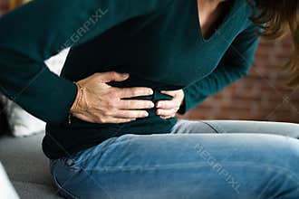 Sick Woman With Abdominal PMS Pain