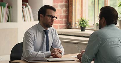 HR manager shake hands hired applicant accomplishing successfully job interview