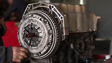 Auto Car Mechanic In Workshop Clutch Set Is Installed