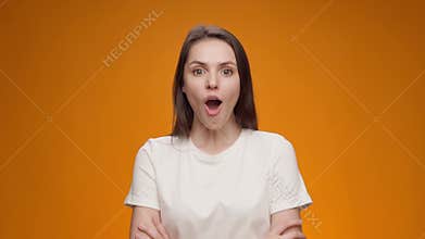Portrait of woman shocked and surprised with good news