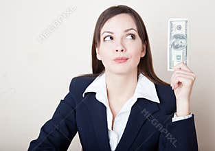 Woman is looking at 100 dollars banknote